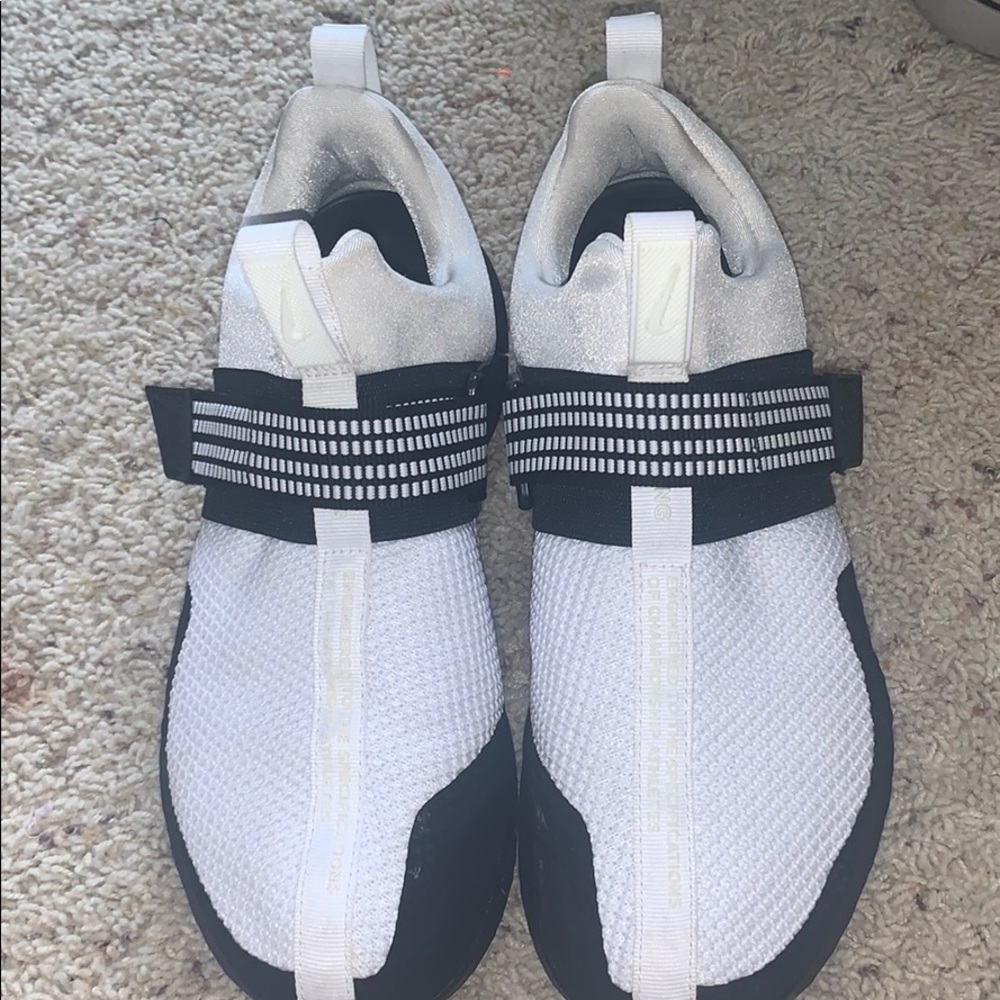 White Nike tennis shoes